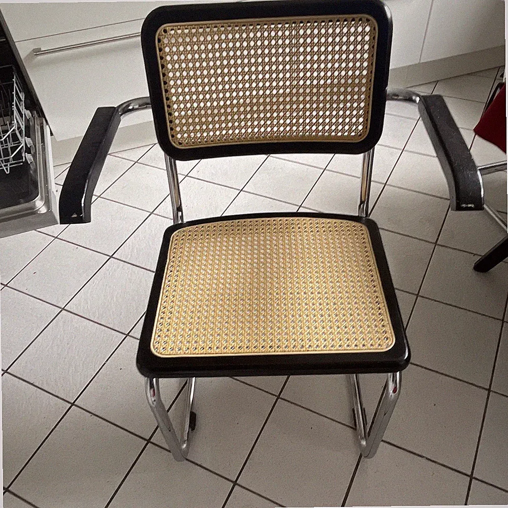 Freischwinger Stuhl mit Armlehnen Chromgestell Geflecht schwarz/beige 60x80