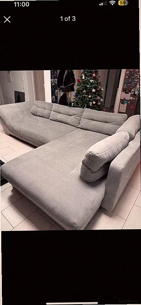Großes graues L- görmiges Sofa für ein Wohnzimmer