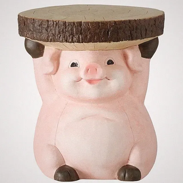 TISCH PIGGY – HANDGEMALTER BEISTELLTISCH IN SCHWEINFORM AUS KERAMIK